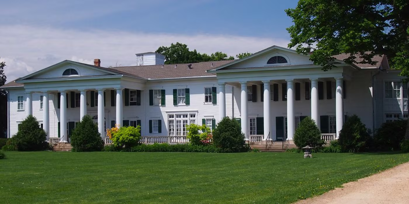 The historic Cordenio Severance House with classical architecture in Cottage Grove, Minnesota.