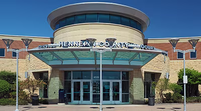 Front entrance of the Hennepin County Court building in Brooklyn Center, Minnesota.
