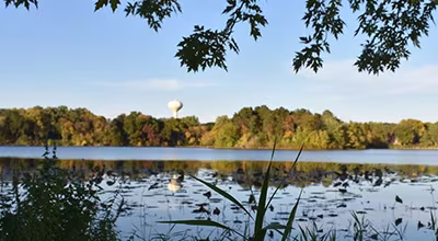 Scenic view of Simley Lake in Inver Grove Heights with a water tower visible in the background.